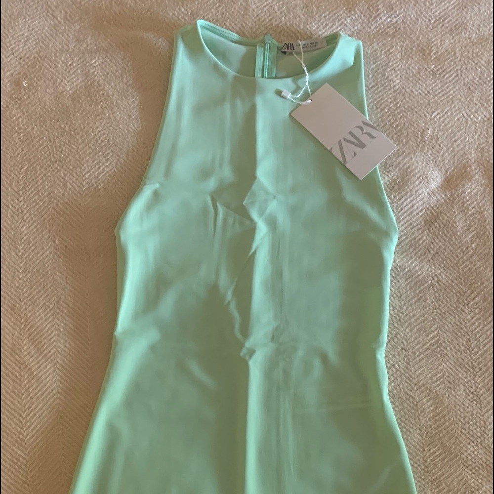 Super cute, lite green, aqua color, tight romper.